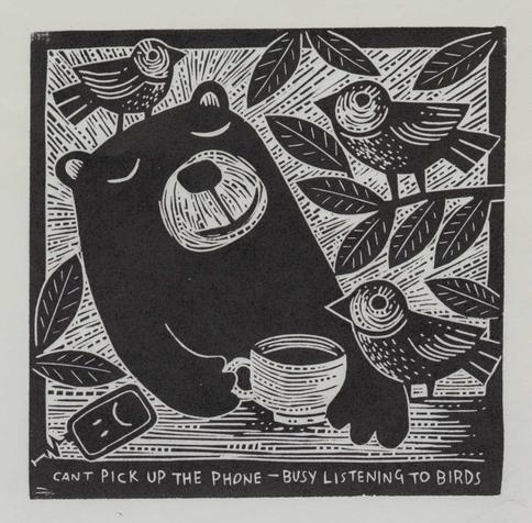 Wood engraving-style illustration of a bear having coffee, eyes closed. Three birds and some branches around him. Pleasant smile and laid-back attitude. A tiny cellphone with a sad face rings in the corner of the frame. Caption reads "Cant pick up the phone - busy listening to birds"