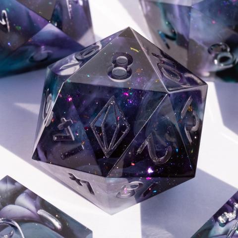 A dark purple D20 with bright specks of glitter surrounded by parts of other dice.