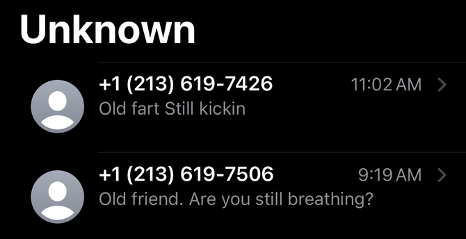 A screenshot of the unknown contacts section on an iPhone showing messages like “old fart still kicking” and “old friend. Are you still breathing?” From different numbers in the 213 area code.