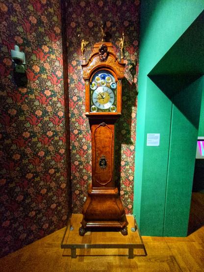A beautiful hardwood grandfather clock.