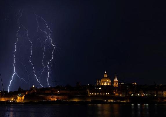 A lightning storm passes over Valletta.