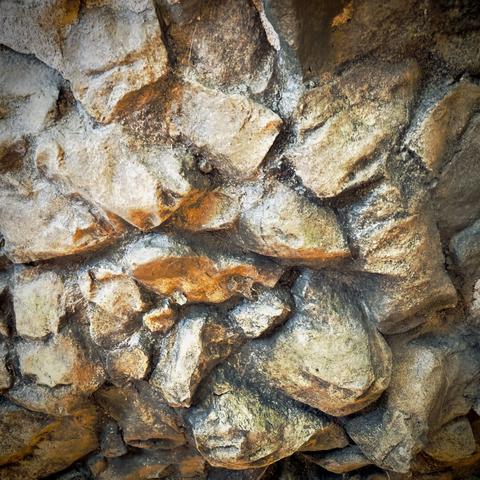 Jagged rocks fill the frame under dim lighting.