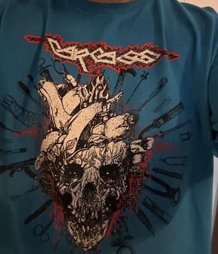 Picture of my blue t shirt. It’s a carcass shirt with a skull and organs surrounded by medical instruments