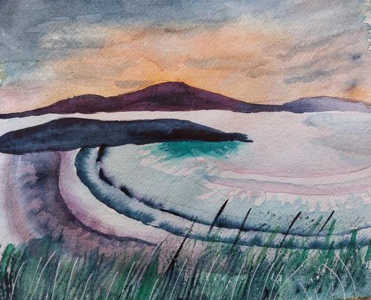 Sunset over islands in Hebrides
