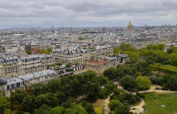 View of portion of Paris as seen from an observation deck of the Eiffel Tower.
