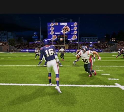 Maximum Football video game screenshot. Quarterback #16 in blue jersey  and defensive player with white jersey red stripes  advancing to sack