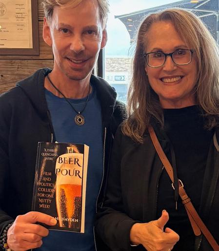 BEER POUR from coast to coast. Baltimore people showing their copy of BEER POUR!