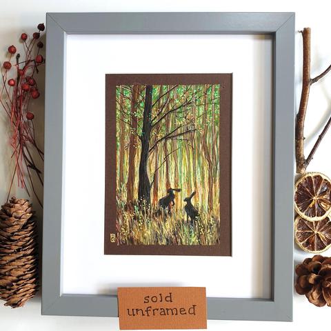 A small colour drawing of silhouettes of hares in a dark autumnal forest landscape. The drawing is on dark brown pastel paper.
An original art work, sold unframed.
Colour pencil and mixed media on acid free toned artist paper
5 by 7 inches (12.7 by 17.8 cm).
