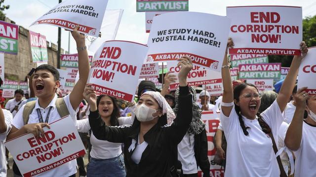 Philippine police arrested 49 after a violent clash near presidential palace