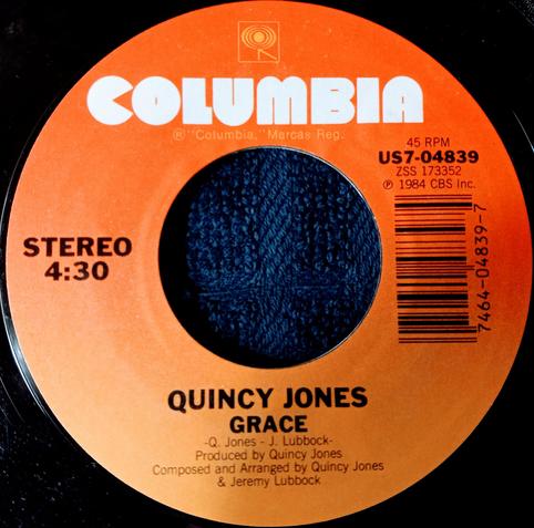 This is the 45 RPM vinyl B-side of the single "We Are the World" by USA for Africa on Columbia Records. This is Quincy Jones with "Grace" dated 1984.
