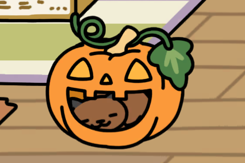Picture from Neko Atsume 2 of a dark brown cat lying inside an orange Jack-o'-lantern pumpkin