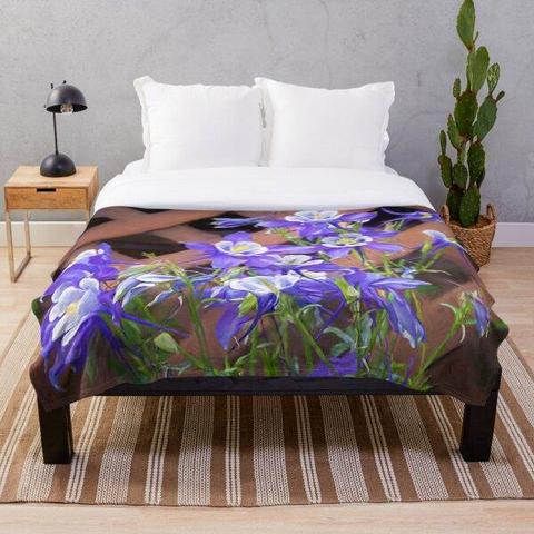 Colorado Columbine flowers growing on a garden lattice structure. This slender beauty of delicate flowers with bright colors is the state flower of Colorado. Digital brushes and filters used for a painterly finish. ©Debra Martz
Image printed on a throw blanket shown across the end of a bed. Colorado Columbine flowers growing on a garden lattice structure. This slender beauty of delicate flowers with bright colors is the state flower of Colorado. Digital brushes and filters used for a painterly finish. ©Debra Martz
Image printed on a throw blanket shown across the end of a bed.