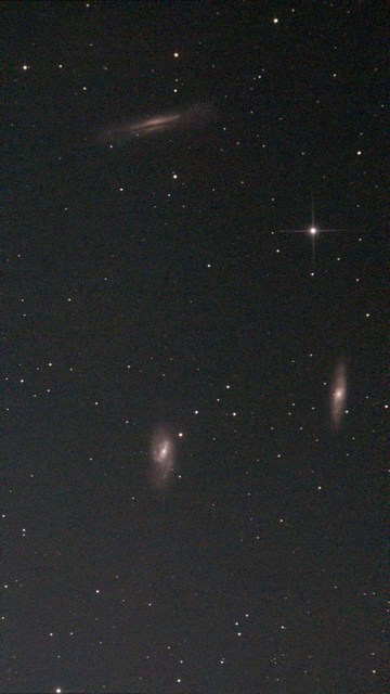 M65 / M66 / NGC 3628 Galaxies - s50 unprocessed image with Moon and Sky Light Filter.  M66 is an intermediate spiral galaxy in the Leo Triplet, notable for its distorted spiral arms and displaced core from past gravitational encounters.