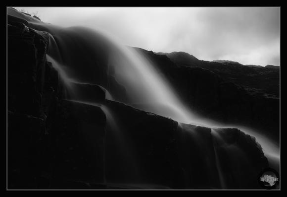 A part of waterfall with backlight.