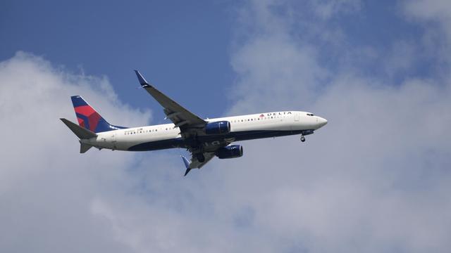 A Delta Airlines plane lands at Sarasota-Bradenton International Airport Friday, March 28, 2025. (AP Photo/Gene J. Puskar, File)