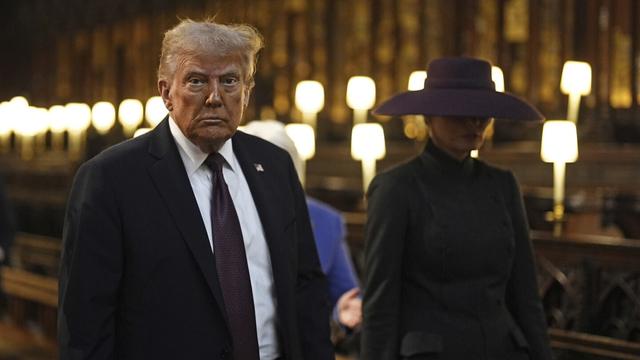 President Donald Trump and first lady Melania Trump attend their visit to St George's Chapel at Windsor Castle, in Windsor, England, Wednesday Sept. 17, 2025. (Aaron Chown/Pool Photo via AP)