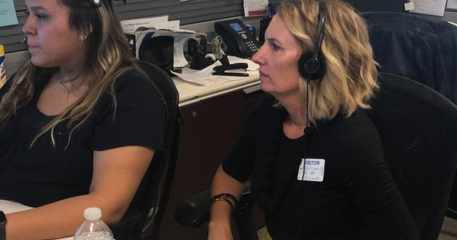 SpringFour CEO Rochelle Gorey wearing headphones at BMO contact center SpringFour CEO Rochelle Gorey wearing headphones at BMO contact center