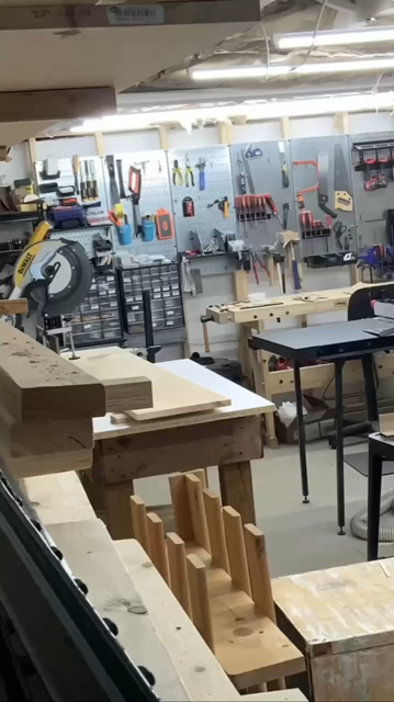 A time-lapse video of cutting some boards to length, then assembling them into a bookshelf, then showing the final project standing attached to a wall.