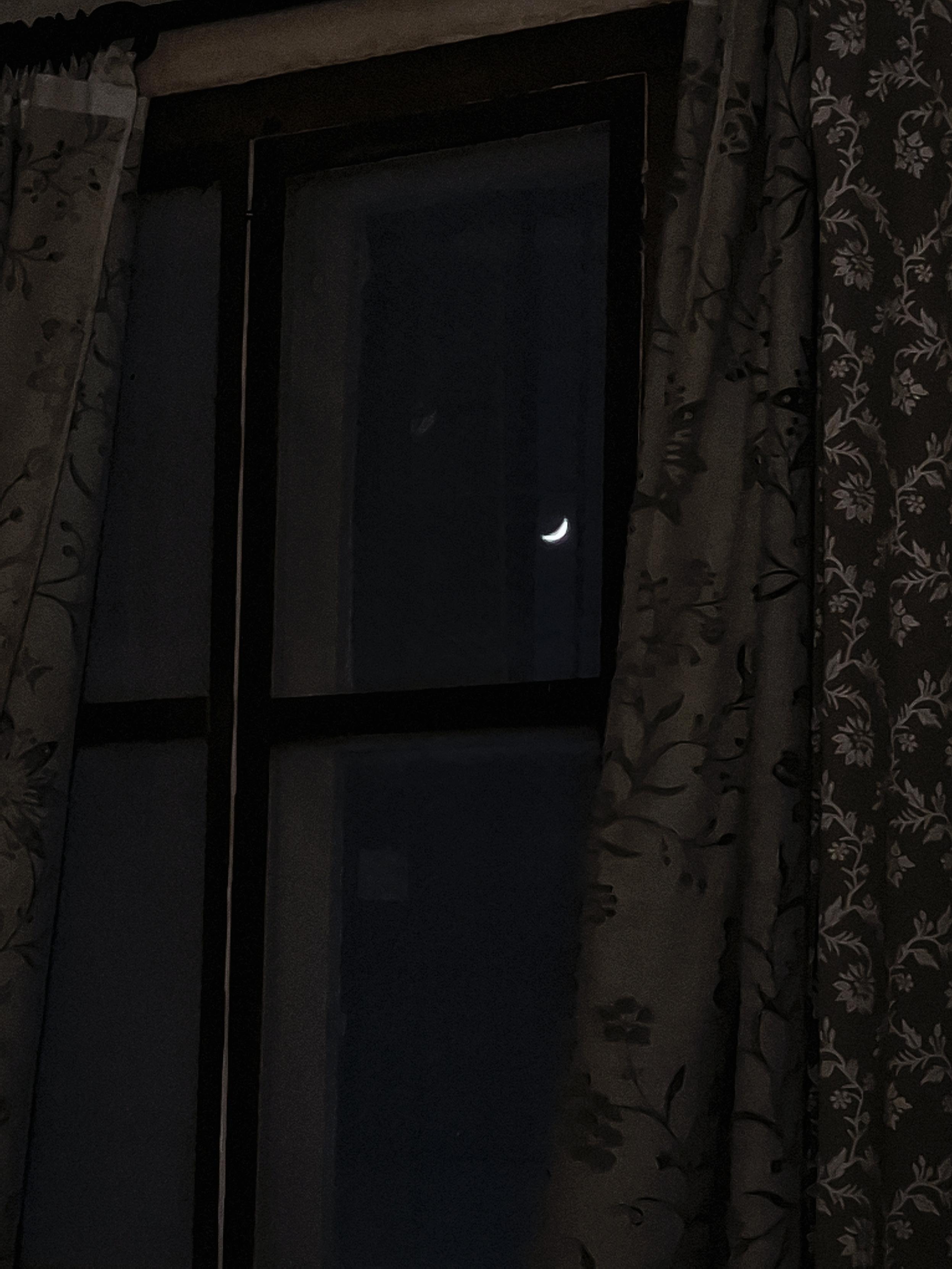 Crescent Moon tonight framed by my windowpane. Curtains on both sides.
Obsession with the Moon continues.